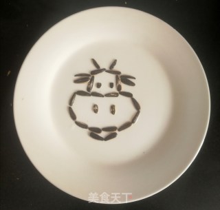 瓜子皮拼摆牛的做法步骤：5