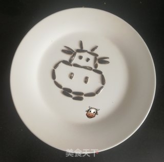 瓜子皮拼摆牛的做法步骤：6