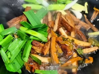 辣椒青蒜炒干子的做法步骤：7