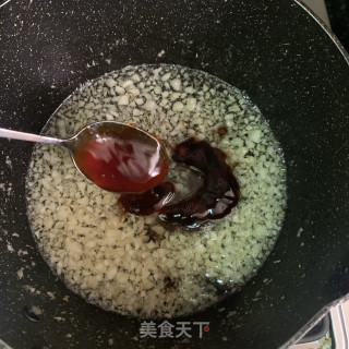 蒜蓉粉丝蒸元贝的做法步骤：7