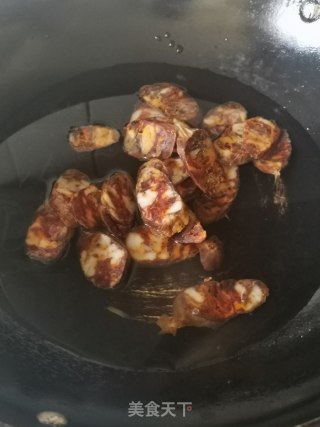 蕨菜干炒麻辣肠的做法步骤：8