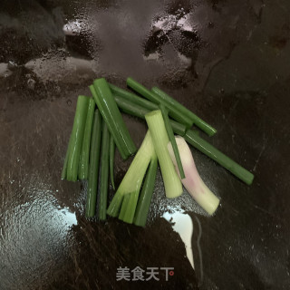 黄瓜炒鲜鱿鱼的做法步骤：4