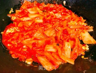 辣白菜金针菇猪头肉豆腐汤的做法步骤：6