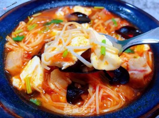 辣白菜金针菇猪头肉豆腐汤的做法步骤：14