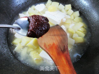 洋芋艿煮豆腐的做法步骤：6