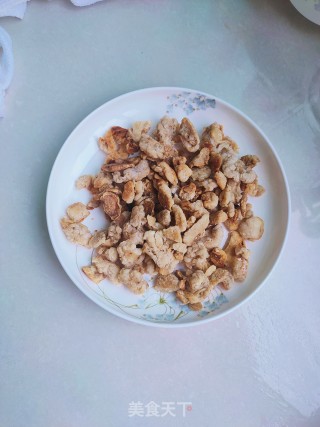 油渣炒茼蒿的做法步骤：4