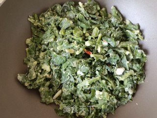 蒜瓣辣椒蒸炒根达菜的做法步骤：13