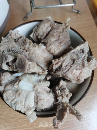菜干焖排骨的做法步骤：4