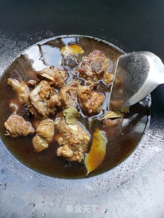 菜干焖排骨的做法步骤：8
