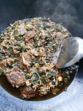 菜干焖排骨的做法步骤：9
