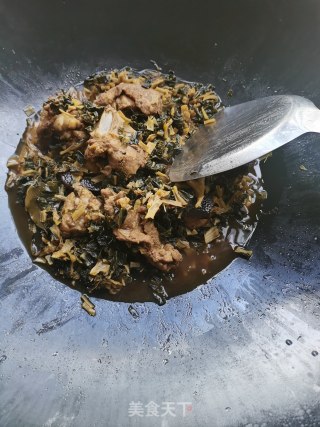 菜干焖排骨的做法步骤：10