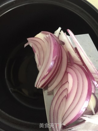 胡萝卜瑶柱扇骨粥的做法步骤：6