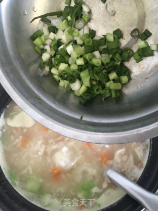 胡萝卜瑶柱扇骨粥的做法步骤：12