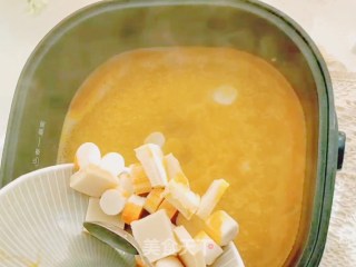 蟹黄豆腐煲的做法步骤：7