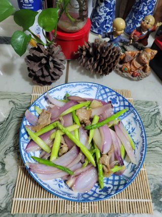 猪肉洋葱炒芦笋的做法步骤：15