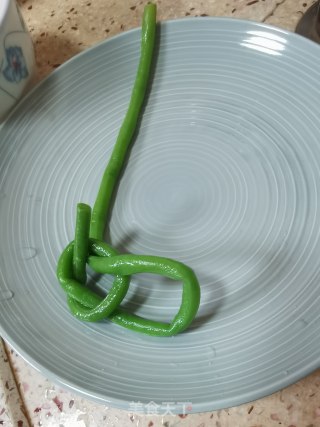 盘花长豆角的做法步骤：11