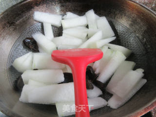 黑木耳烤火腿煮冬瓜的做法步骤：3