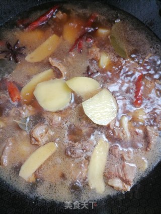 土豆烧牛腩的做法步骤：11