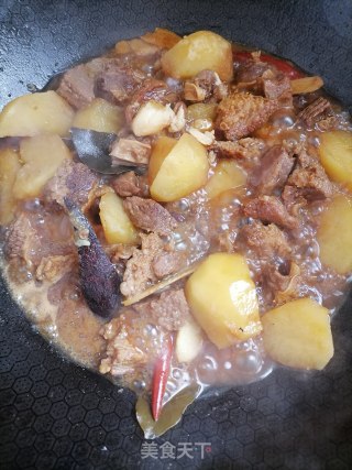 土豆烧牛腩的做法步骤：12