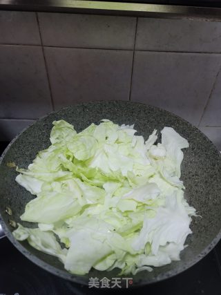 猪肉渣炒手撕包菜的做法步骤：4