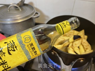 豆酱茄子年糕煲的做法步骤：5