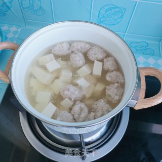 藕丸豆腐裙带菜汤的做法步骤：11