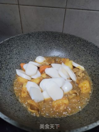 咖喱护心肉炒年糕的做法步骤：7