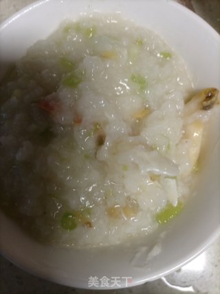 海鲜砂锅粥的做法步骤：9