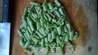 梅干菜炒豆角的做法步骤：1