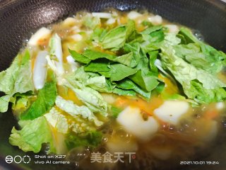 酸菜煮年糕的做法步骤：4