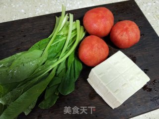 番茄鸡蛋炖豆腐的做法步骤：1