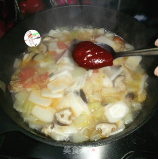 白菜香菇辣年糕汤的做法步骤：7