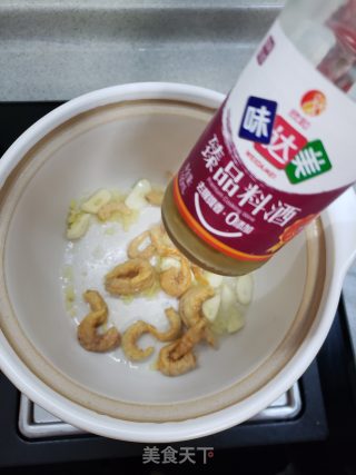 酸甜鲜香番茄鱼丸金针菇粉丝煲的做法步骤：6