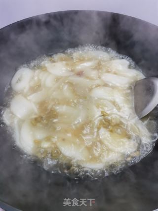 酸豆角煮水浸糍的做法步骤：8