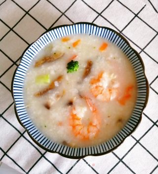 骨汤海鲜粥的做法步骤：6