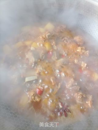 土豆烧排骨的做法步骤：7