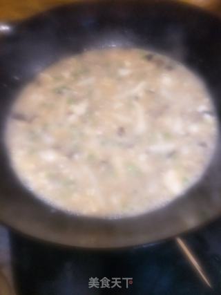 海鲜菇豆腐汤的做法步骤：7
