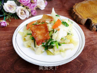 咸肉包菜炒年糕的做法步骤：9