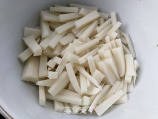 咸肉包菜炒年糕的做法步骤：6