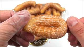 西班牙油条吉事果，做法简单，一口咬下去，外脆里嫩，口感轻盈。的做法步骤：14