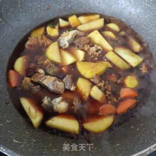 土豆烧牛腩的做法步骤：9