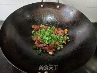 干炒牛肉的做法步骤：11