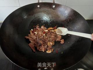 干炒牛肉的做法步骤：7