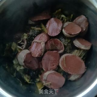 酸菜血肠水煮肉片的做法步骤：16
