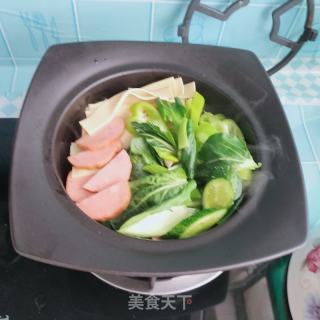 砂锅炖耦合的做法步骤：7