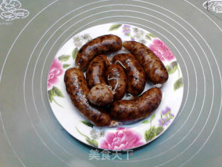 腊肉蘑菇糯米肠的做法步骤：23