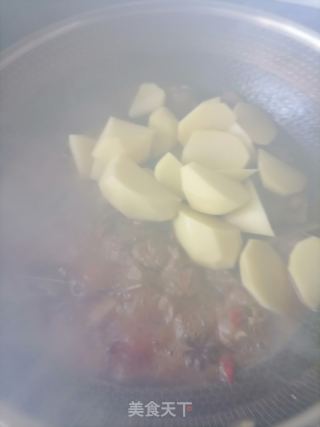 土豆烧排骨的做法步骤：7