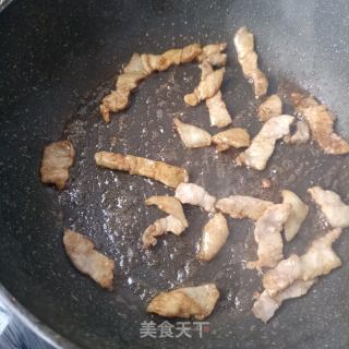 鸡蛋干猪肉炒辣椒的做法步骤：9