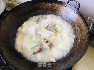 冬瓜鱼头炖豆腐的做法步骤：5