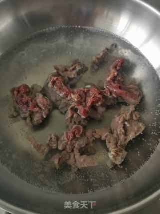 牛肉辣白菜炒年糕的做法步骤：7